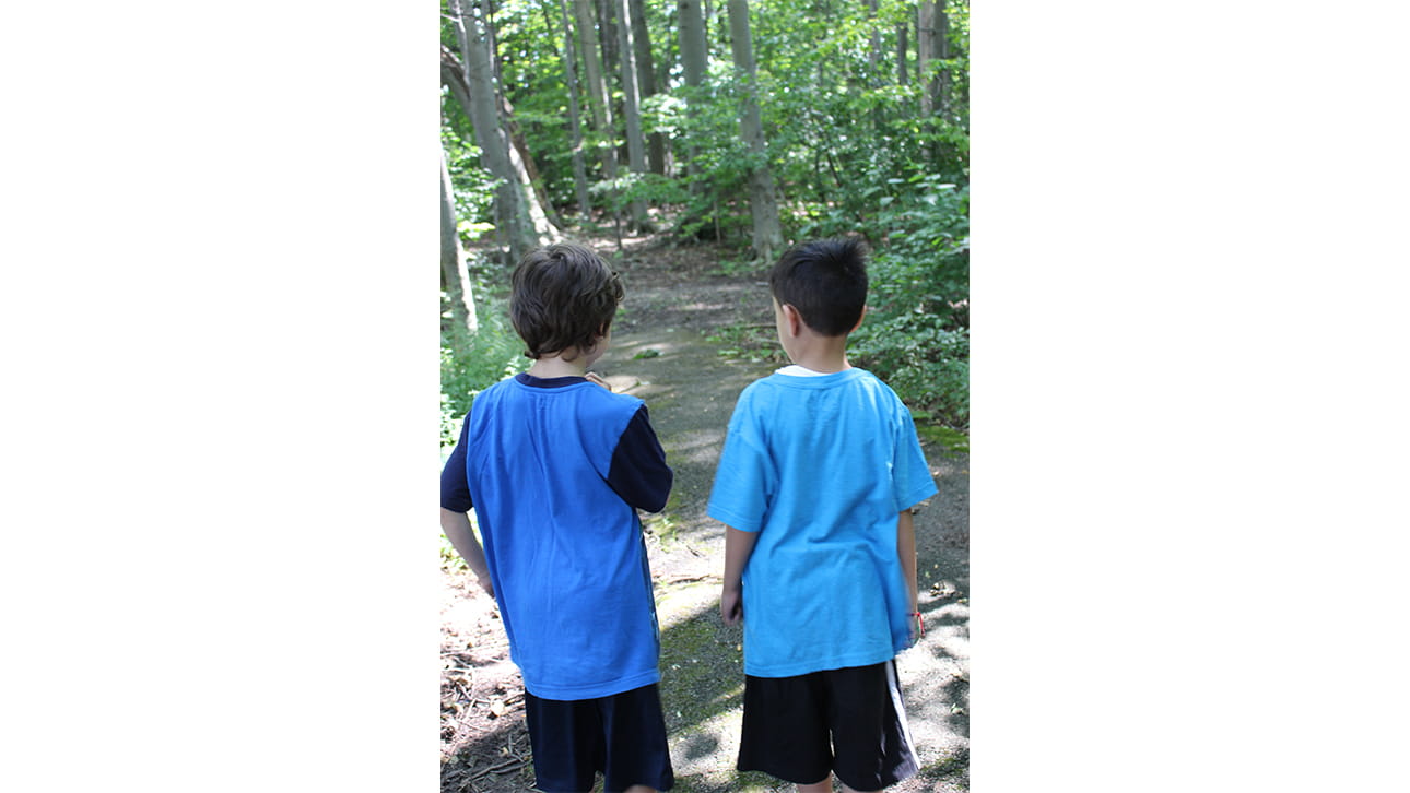 two young boy walking at CompassionNet's SibsROCK! day 