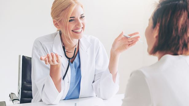 female talking with her doctor during an appointment 