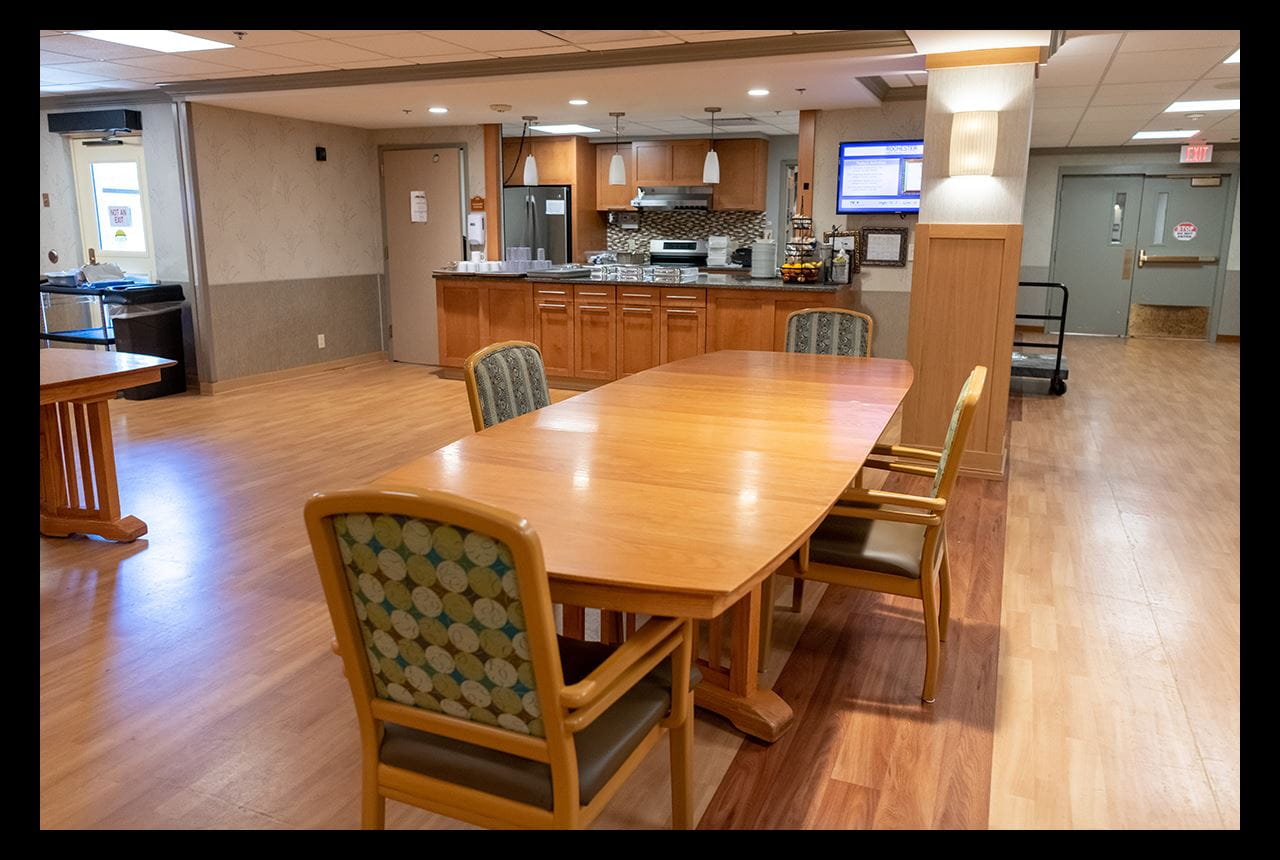 Each resident unit has its own kitchen and welcoming dining area where meals are served.