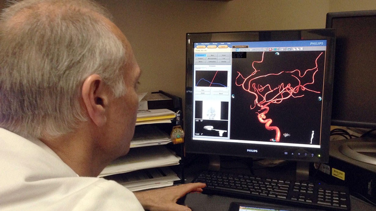 doctor examining a vein process image 