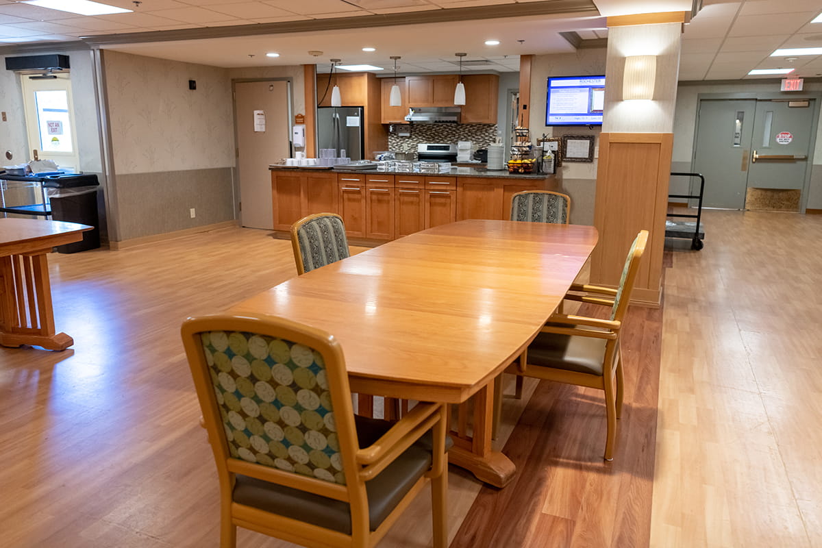 Each resident unit has its own kitchen and welcoming dining area where meals are served.