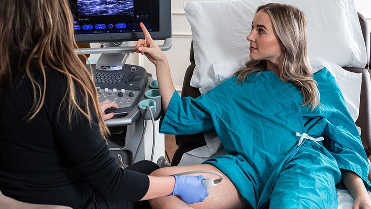 woman receiving a vein screening